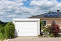 modern entrance area and garage in suburban street Royalty Free Stock Photo