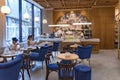 Modern european cozy cafe with upholstered blue furniture in Riga Old Town