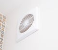 Modern exhaust fan in the bathroom to ventilate the room from unpleasant odors and humidity, close-up
