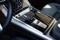 Modern and expensive car interior and gearbox shift handle. Close up of the automatic gearbox lever, black interior car. Automatic Royalty Free Stock Photo