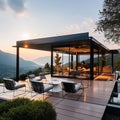 Modern exterior of a luxury villa in a minimal style. Glass house in the mountains. Royalty Free Stock Photo