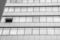 Modern facade of office building with glass and steel. One open window. Reflection sky and clouds. Exterior of futuristic business Royalty Free Stock Photo