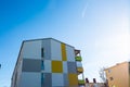 Modern facade of a residential building, blue sky