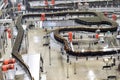 Modern factory in the food industry - beer brewery - conveyor belt with beer bottles and machines for production