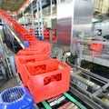 modern factory in the food industry - beer brewery - conveyor belt with beer bottles and machines for production Royalty Free Stock Photo