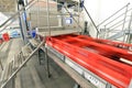 modern factory in the food industry - beer brewery - conveyor belt with beer bottles and machines for production Royalty Free Stock Photo