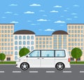 Modern family minivan in urban landscape Royalty Free Stock Photo