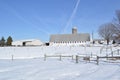 Modern barn in snowy field Royalty Free Stock Photo