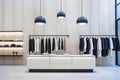 Modern fashion boutique with minimalist shelves and chic pendant lighting