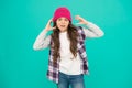 Modern fashion. How cool am I. Kids fashion. Girl cute child wear knitted hat. Little girl wearing winter hat. Comfy and