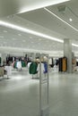 Modern fashionable brand interior of empty women clothing store inside shopping center