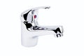 Modern faucet, a cold/hot water mixer tap, for the bathroom isolated on a white background Royalty Free Stock Photo