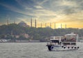 Modern ferry boat sailing in Marmara sea near Istanbul, with Ayasofya mosque at the far end, Istanbul, Turkey