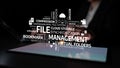 Modern file management concepts with cloud storage, synchronization, metadata, and virtual folders on a sleek tablet Royalty Free Stock Photo
