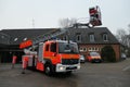 Modern fire truck. Fire truck with articulated turntable ladder, additional rear wheel steering, swi Royalty Free Stock Photo