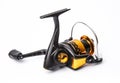 Modern fishing reel on  white background Royalty Free Stock Photo