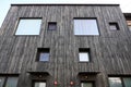 Modern flat wood facade covers two old Brooklyn row houses