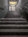 Modern flight of stairs with concrete steps leading up, vertical