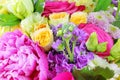 Modern floral bouquet of different flowers, colorful bunch of flowers.Red roses, Chrysanthemum. Freesia and Eustoma