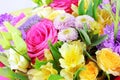 Modern floral bouquet of different flowers, colorful bunch of flowers.Red roses, Chrysanthemum. Freesia and Eustoma