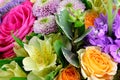 Modern floral bouquet of different flowers, colorful bunch of flowers.Red roses, Chrysanthemum. Freesia and Eustoma