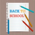 Modern flyer, poster template with Back To School hand drawn text. Notebook paper. Colorful Colored Pencils Royalty Free Stock Photo