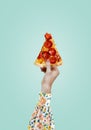 Modern food poster. Woman holding a piece of salami pepperoni pizza. Modern food concept. Advertising, marketing and business. Royalty Free Stock Photo