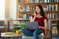 Modern Freelance. Relaxed Asian Girl Using Cellphone And Laptop At Cafe Royalty Free Stock Photo