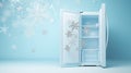 modern fridge and flying snowflake on light blue background