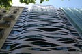 Modern futurist building in street of Barcelona