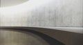 Modern and futuristic empty light interior with concret wall and reflections on the floor. Concept of interior design Royalty Free Stock Photo
