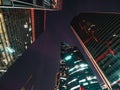 Modern futuristic skyscrapers buildings in business center in Moscow city at night with illuminated windows and lights Royalty Free Stock Photo