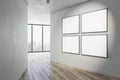 Modern gallery interior with mock up banner on white concrete wall, wooden flooring and window with city view. Museum or apartment