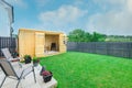 Modern Garden Designed and landscaped with newly Constructed Materials Including New Summer House Silver Copse painted Fencing and Royalty Free Stock Photo