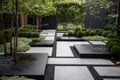 modern garden with sleek, minimalist design, featuring metal pathways and black stepping stones Royalty Free Stock Photo