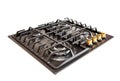 Modern gas hob stove made of steel and cast iron with golden controls using natural gas or propane for cooking products Royalty Free Stock Photo