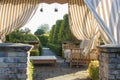 Modern gazebo in cottage garden