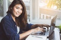 Modern generation of entrepreneur concept. Happy young women smiling and working on laptop computer at home