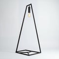 Geometric lamp, black framework, triangle structure, minimalist design on white background Royalty Free Stock Photo