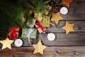 Modern gifts on a wooden rustic table with copy space. Christmas background. View from above.