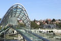 Modern glass Bridge of Peace in the old part of Tbilisi