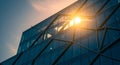 Modern Glass Building Facade Reflecting Bright Sun and Sky with Geometric Patterns architecture contemporary Royalty Free Stock Photo