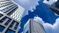 modern glass building skyscrapers over blue cloudy sky Royalty Free Stock Photo