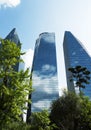 Modern glass buildings catching clouds Royalty Free Stock Photo