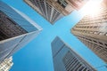 Modern glass and classic tall office buildings in New York. A perspective view from below