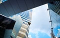 Modern glass exterior of business office building against sky Royalty Free Stock Photo