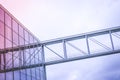 Modern glass facade and steel bridge - office building exterior Royalty Free Stock Photo