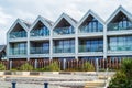 Modern glass fronted apartment homes on the sea front in Whitstable, Kent, UK Royalty Free Stock Photo