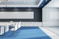 Modern glass meeting or conference room interior with furniture, blue carpet and blank wide black mock up banner on wall. 3D Royalty Free Stock Photo