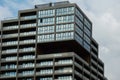 Modern glass office building exterior with glass facade on clear sky background. Transparent glass wall of office Royalty Free Stock Photo